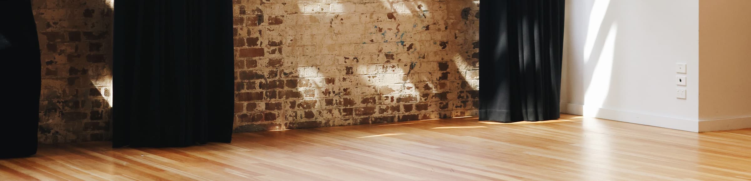 View of wall and floor within the Tramsheds venue.